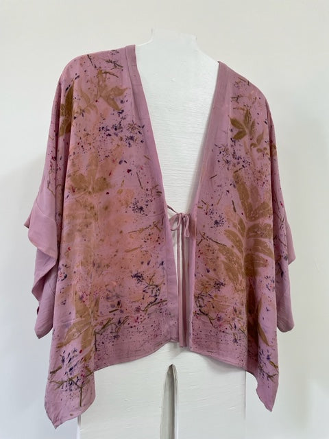vibrant pink silk kimono jacket with eco print on white body form