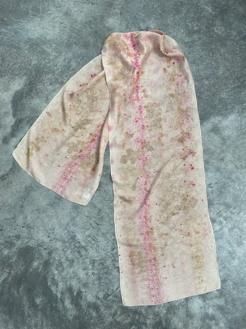 silk scarf pale pink with natural eco dye leaf print on concrete ground